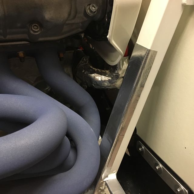 Zircotec's ZircoFlex on chassis tubes and coolant pump inlet.jpg