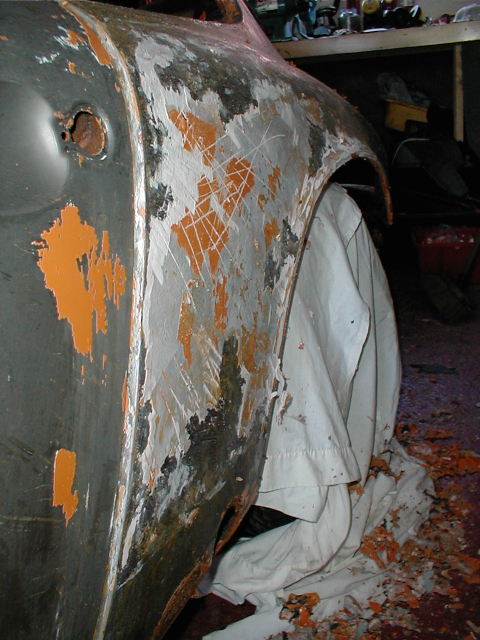 A layer of filler from some minor accident damage.