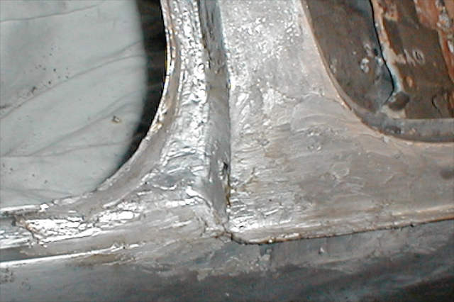 Smoothing off the lead (wooden spatular and tallow used)