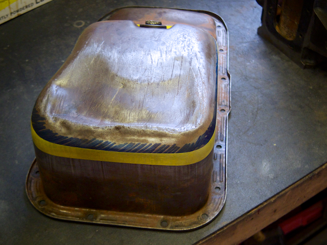 The old battered sump pan