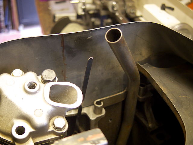 Checking the oil return and dip stick positions to plan the trapdoor positions