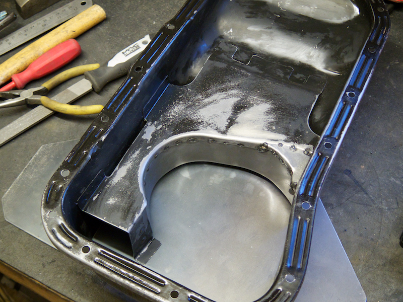 Small section added to extend the top baffle, picking up on the trapdoor hinge mount. This will need a bit of fettling when I reshape the oil return tube.