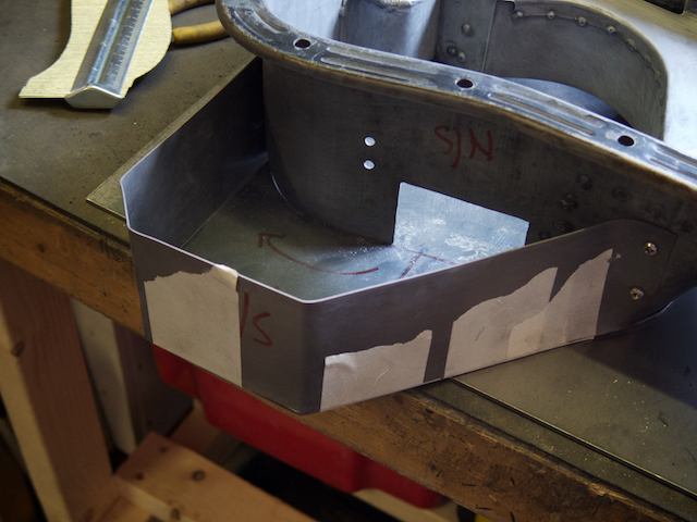 Self-tapping the wing side in place so I could make templates for the box tops.